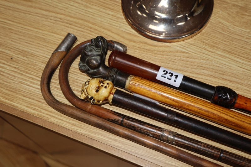 A late 19th / early 20th century stiletto sword cane, with faux tortoiseshell handle, locking collar and 35cm faceted toledo blade,